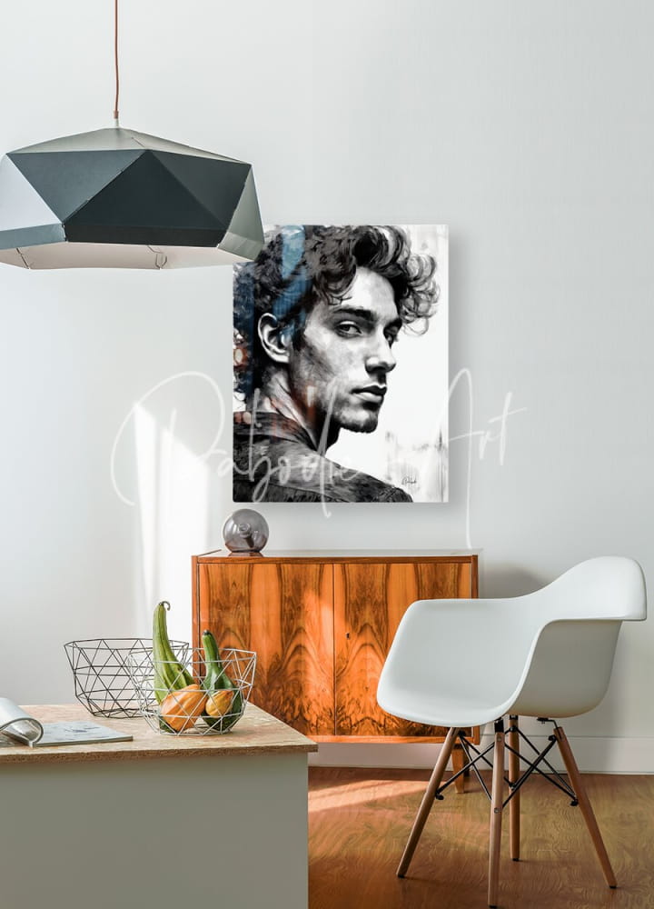 Black-and-white portrait canvas titled bad boy featuring a man with curly hair mounted on a white wall