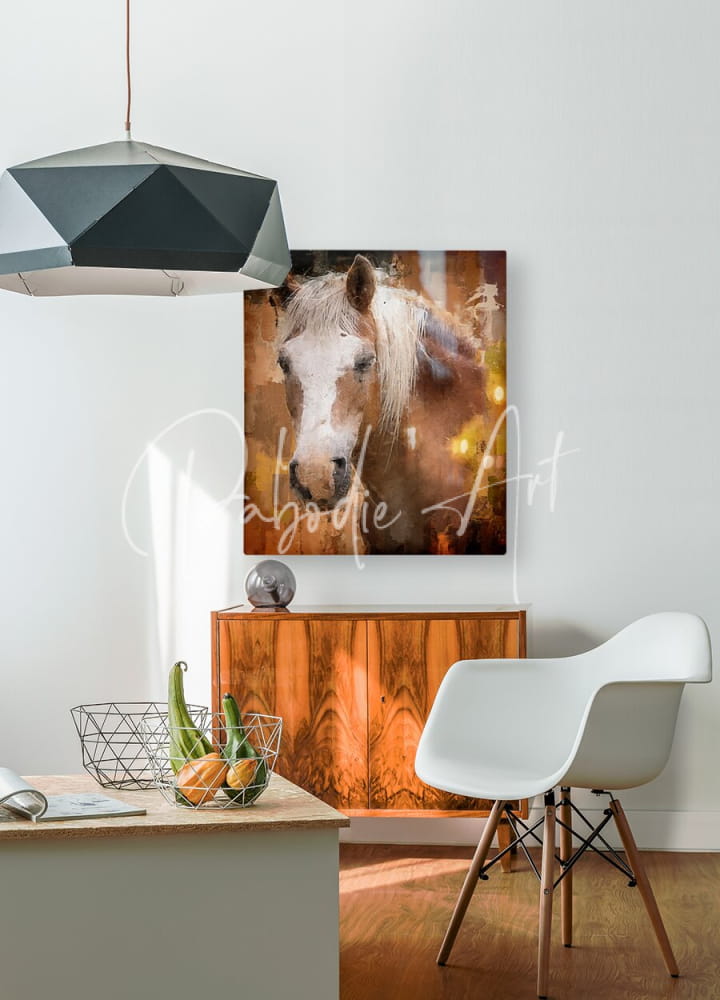 A warm-toned canvas print of a beautiful palomino horse with a flowing mane mounted on a wall