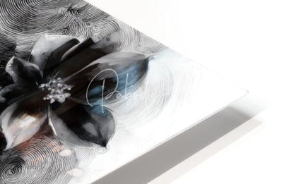 A sleek black and white abstract canvas named beauty serene featuring a stylized flower with metallic accents signed by artist