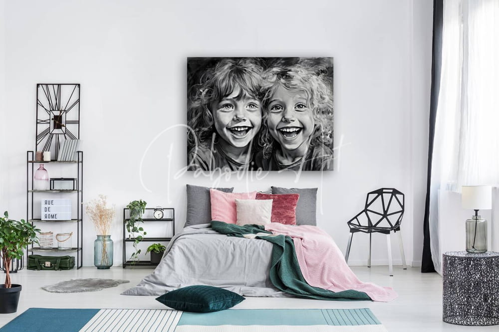 Black and white canvas print of two smiling children hanging above bed titled besties for bedroom decor