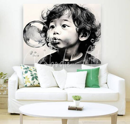 Black and white canvas print of a child with curly hair blowing bubbles featuring detailed shading titled blowing bubbles