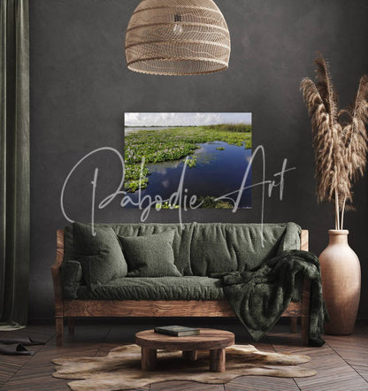 Dark green textured fabric sofa with wooden frame and matching throw pillows from the blue cypress lake collection