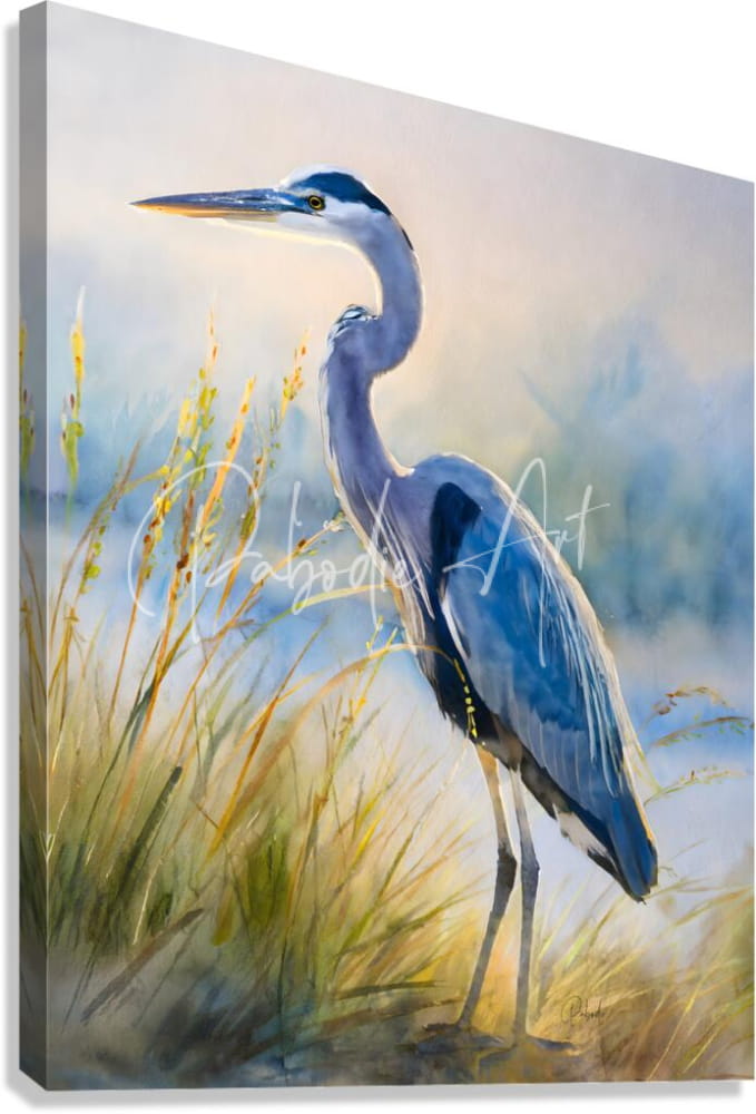 Blue heron beachside canvas print featuring a detailed blue heron standing in tall golden grass under soft light