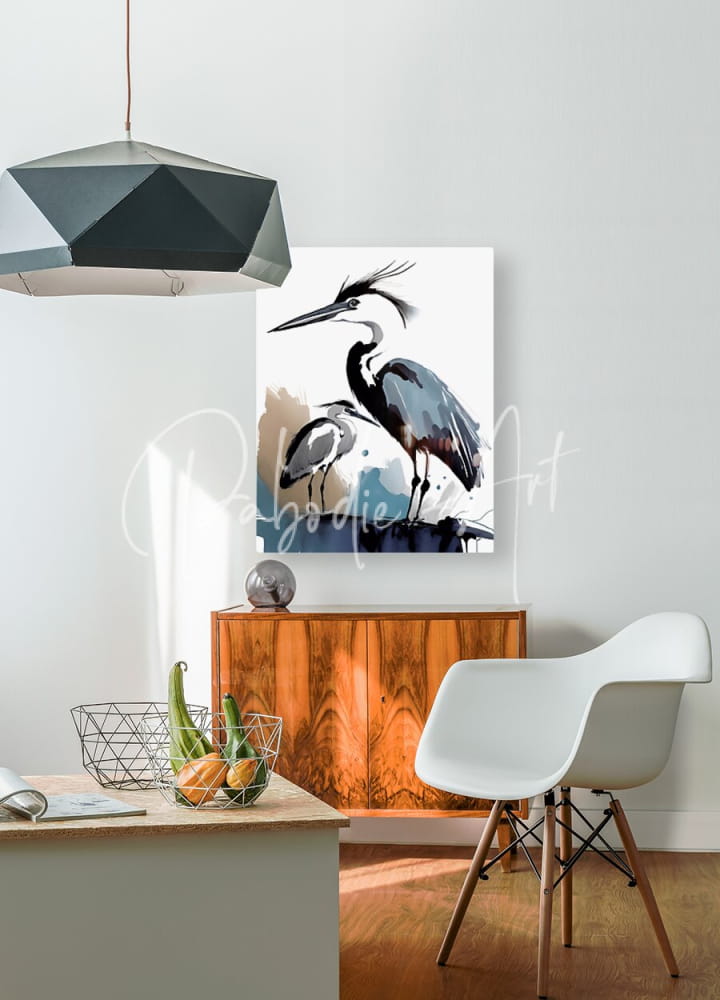 A modern watercolor painting wall art of two gray and black herons titled the blue heron and the egret