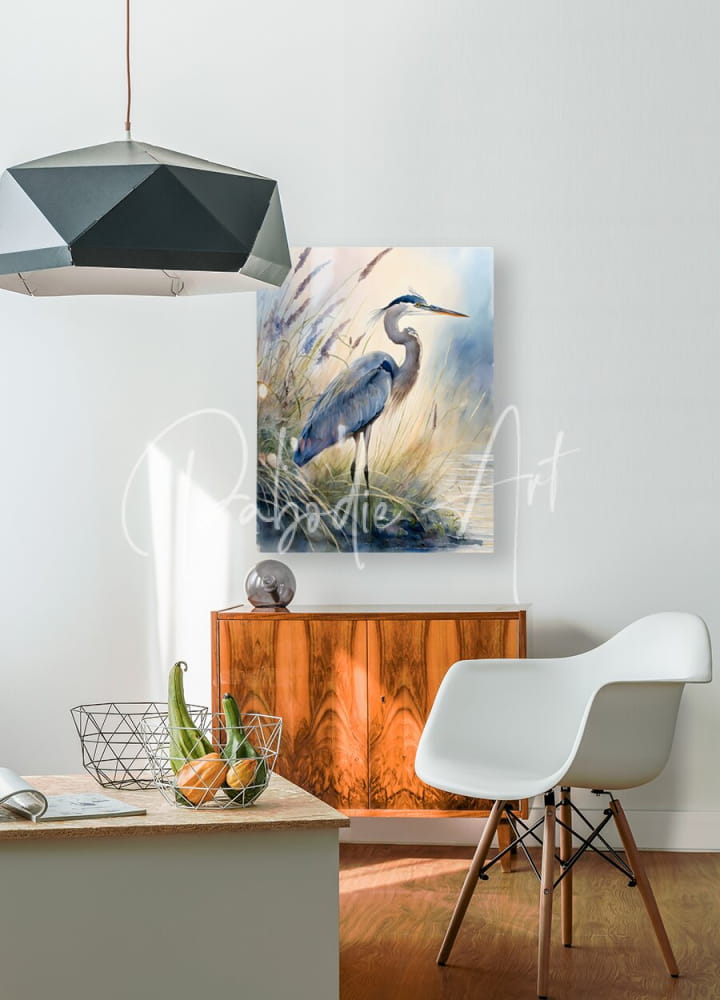 Framed watercolor painting of a blue heron standing in tall grass titled blue heron in the seagrasses hanging on wall