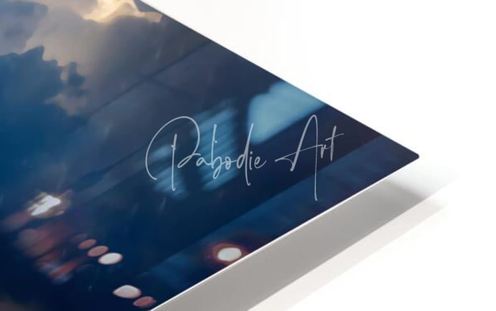 A sleek modern art print titled blue herons at dawn with a deep blue abstract sky and soft bokeh lights signed pabodie art