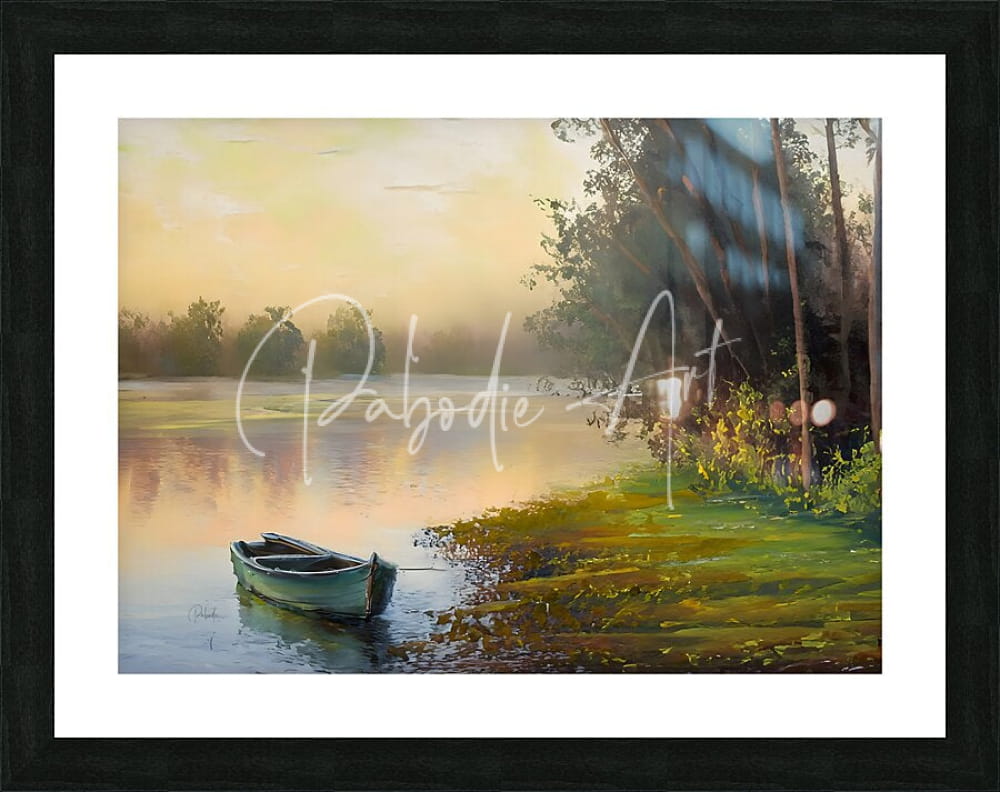 A framed painting titled the boat along the bank showing a weathered green rowboat resting on calm water at dawn or dusk