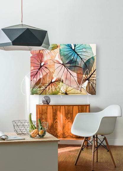 A vibrant watercolor painting titled caladium colors I featuring overlapping leaves in soft pinks blues and greens on wall