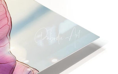 A sleek light blue metallic plaque featuring the cursive signature pabodie art in the caladium colors ii product