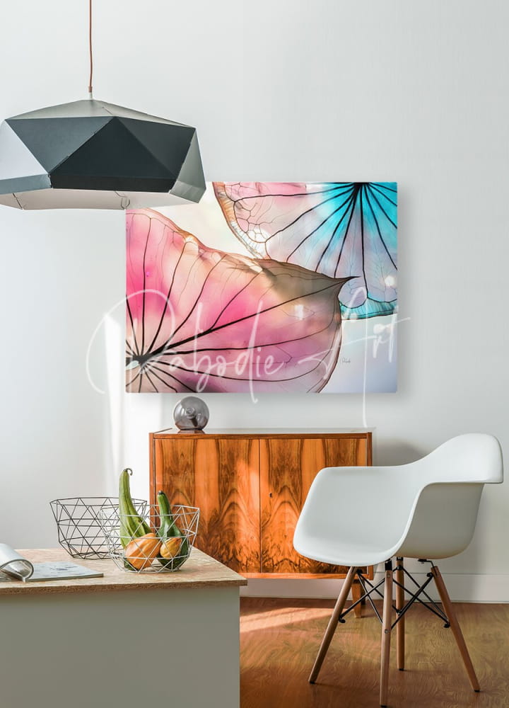 A vibrant abstract painting caladium colors iii featuring pink and blue lotus petals with delicate black veining on white wall