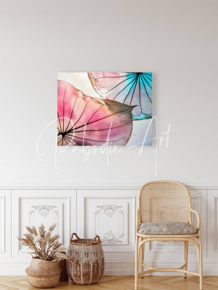 Watercolor painting caladium colors III with overlapping lotus leaves in soft pink and teal hues on white wall