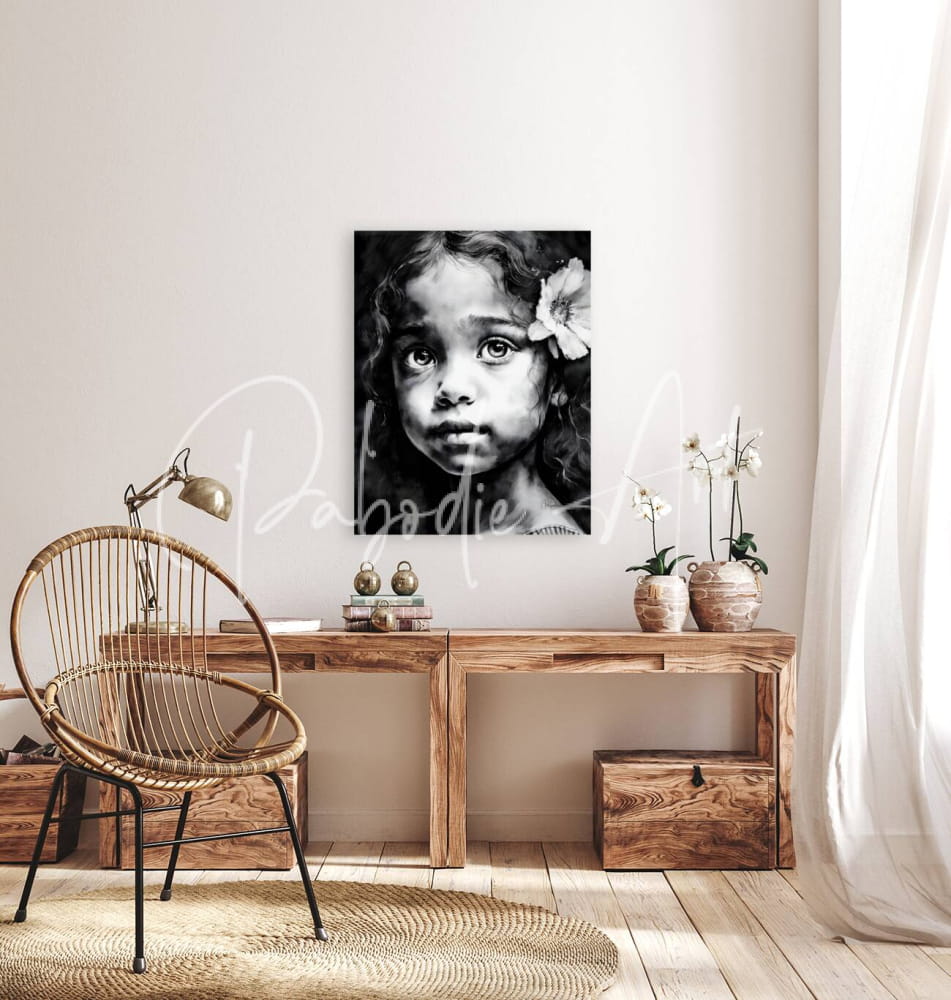 Chiara black-and-white canvas portrait of a young girl with curly hair and flower mounted on wall