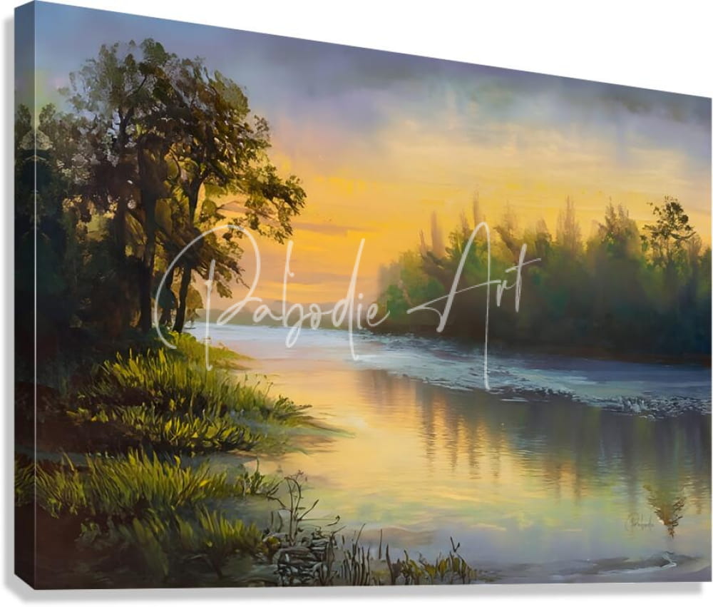 A serene sunset landscape painting on stretched canvas featuring warm golden hues reflecting off calm water with silhouetted trees