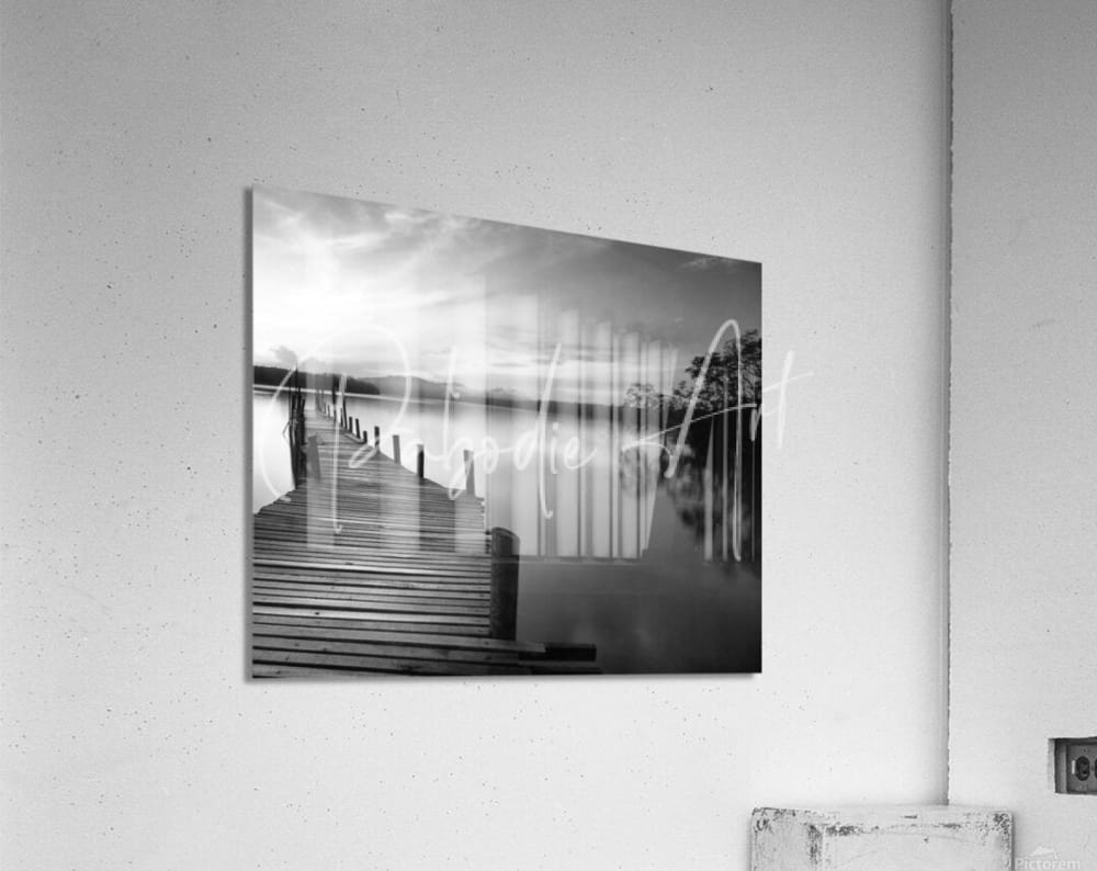 Black and white acrylic print of a wooden pier with abstract vertical light streaks titled dawn breaks over still waters
