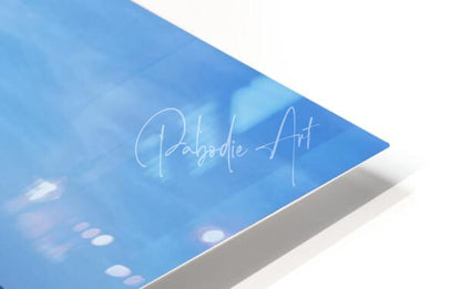Blue rectangular art print titled dock of better days with white cursive pabodie art text and soft cloud patterns