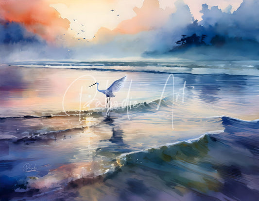 A white egret fishing figurine poised with wings spread against a vibrant sunset sky on a wet shoreline