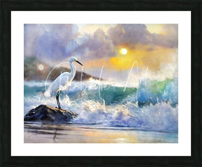 A framed watercolor painting titled the egret and the rough sea depicting a white egret on a rock at sunset