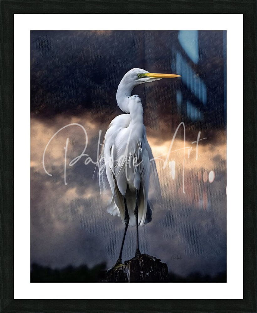 A framed artwork titled Egret Standing Tall showing a white great egret with a yellow beak on a dark post