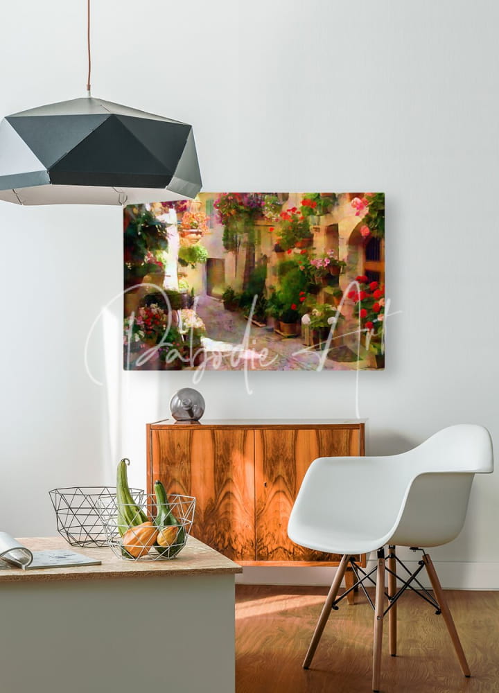 A vibrant rectangular canvas print titled flower filled cobblestone alley showing a sunlit european alley with colorful flowers