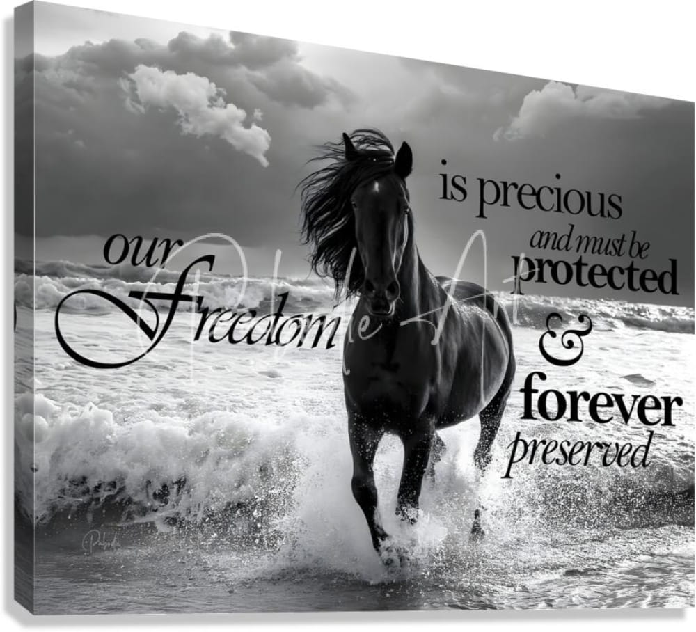 Black and white canvas print of a dynamic horse galloping through ocean waves titled freedom horse with elegant script text