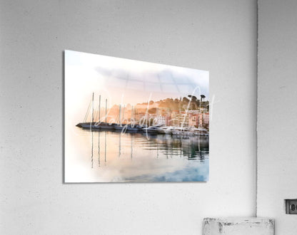 Watercolor-style print of french riviera shoreline reflections featuring boats and buildings at sunrise with calm water reflections