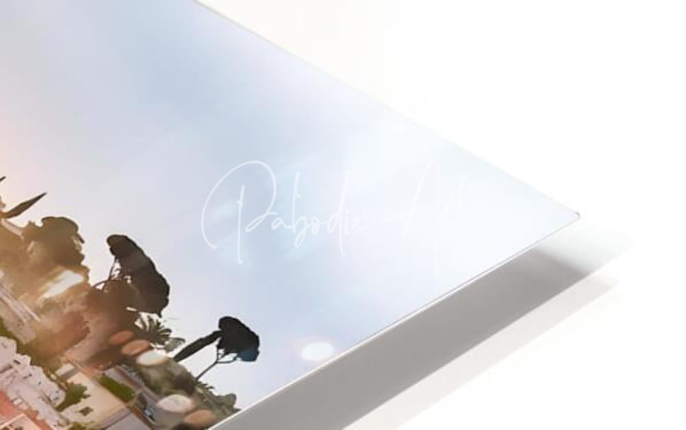A sleek transparent acrylic print of the french riviera shoreline reflections with sunlit coastal scene and palm trees