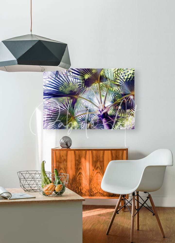 A vibrant rectangular canvas print titled glorious palms featuring stylized green and purple palm fronds on the wall