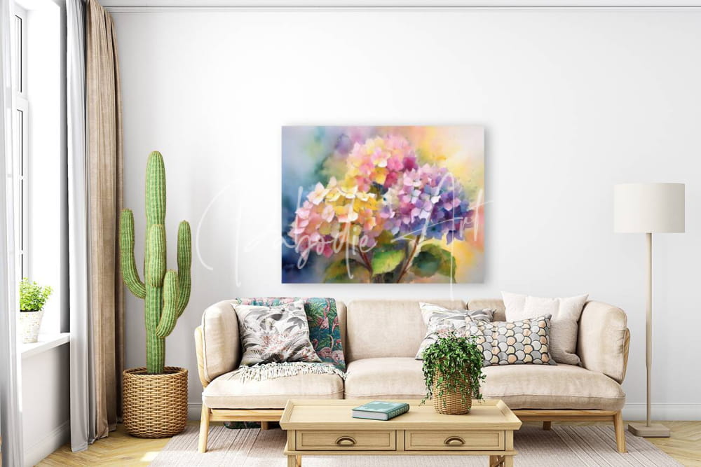 A vibrant watercolor painting of pink purple and yellow hydrangea blooms hanging above a beige sofa