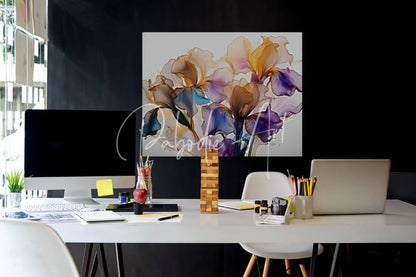 A vibrant abstract painting of irises in purple blue and orange above a modern white desk titled Iris Golden Petals