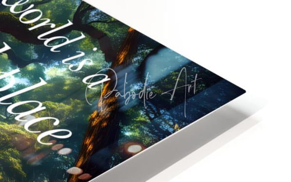 Magical treasures sleek acrylic print with lush green and blue forest scene and white cursive text by pabodie art