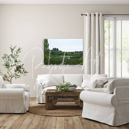 A rectangular canvas print titled natural serenity featuring a serene green marshland with reeds and distant trees