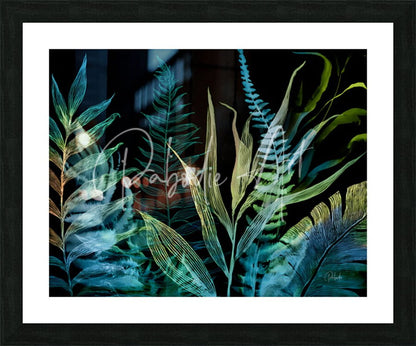 A framed botanical art print titled Night Tropics with translucent layered ferns in teal green and gold on dark background