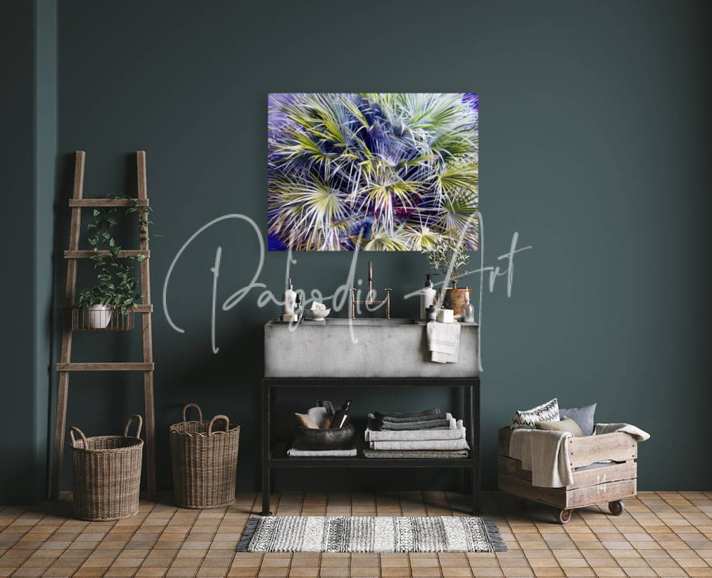 Vibrant abstract floral canvas painting palms and berries with bold purple green and blue hues on dark teal wall
