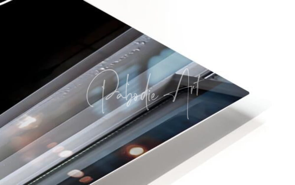 A sleek glossy black framed art print titled A Perfect Love featuring a modern cityscape and pabodie art signature