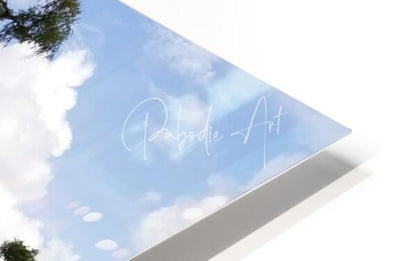 A triangular canvas print with a soft blue sky and white clouds featuring elegant cursive pabodie art text perfect osprey nest