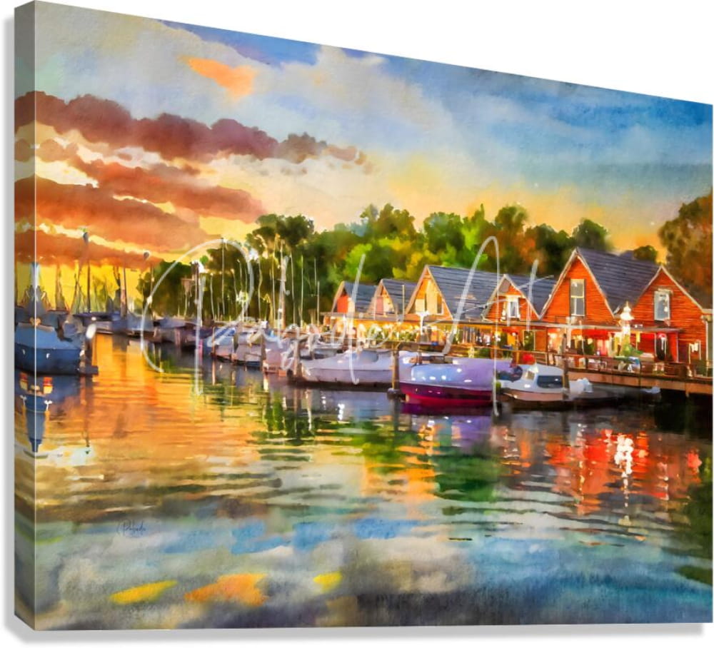 Watercolor painting titled River Living Sunset of a harbor at sunset with red-roofed buildings and boats reflected in water