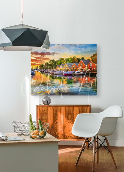 Vibrant sunset harbor scene canvas print featuring red and orange buildings reflected in calm water titled river living sunset