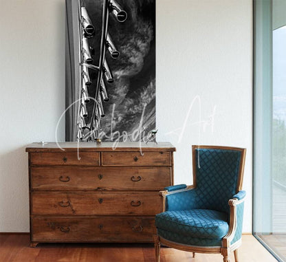 Blue upholstered armchair with wooden frame and diamond-patterned fabric, featured in rod holders collection