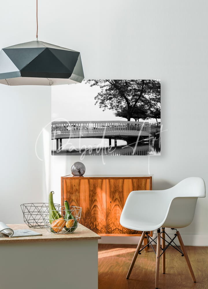 Black-and-white canvas print of sawmill creek wooden bridge with trees mounted on a white wall