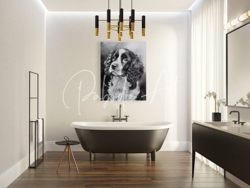 Black and white portrait of springer spaniel puppy dog hanging on wall above freestanding bathtub in bathroom decor