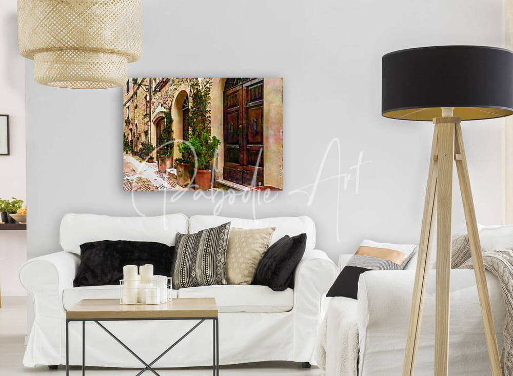 A rectangular canvas print of rustic european street scene with warm stone walls arched doorways and aged wooden door