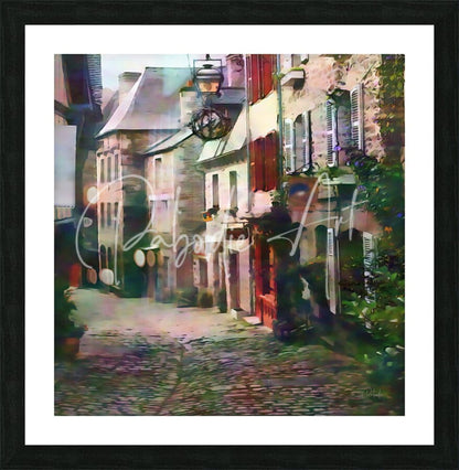 Black-framed art print of stylized impressionistic cobblestone european street with stone buildings and red shutters titled stone shops of character