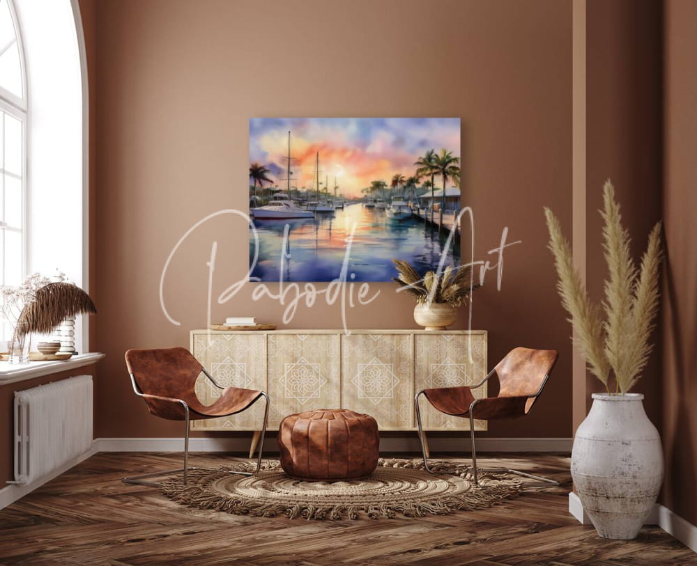 A vibrant watercolor painting titled Sunset Along the Canal depicting a colorful sunset over a marina with sailboats and palm trees