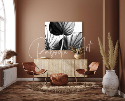 Black and white botanical canvas art featuring bold stylized leaf silhouettes titled tree of life leaf art