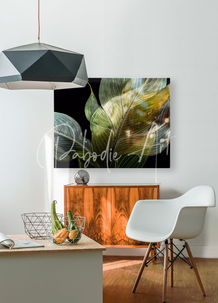 Abstract botanical canvas print tropical leaves on black with translucent green and gold leaf patterns in sleek frame