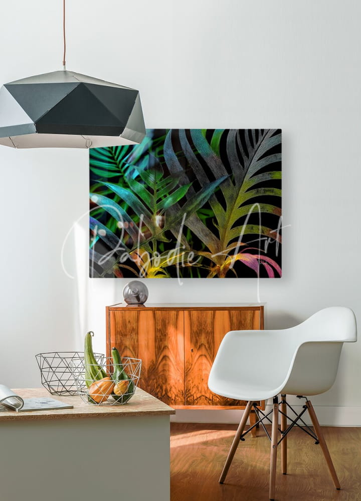 Vibrant tropical leaf artwork in a modern geometric frame featuring colorful night-themed foliage design