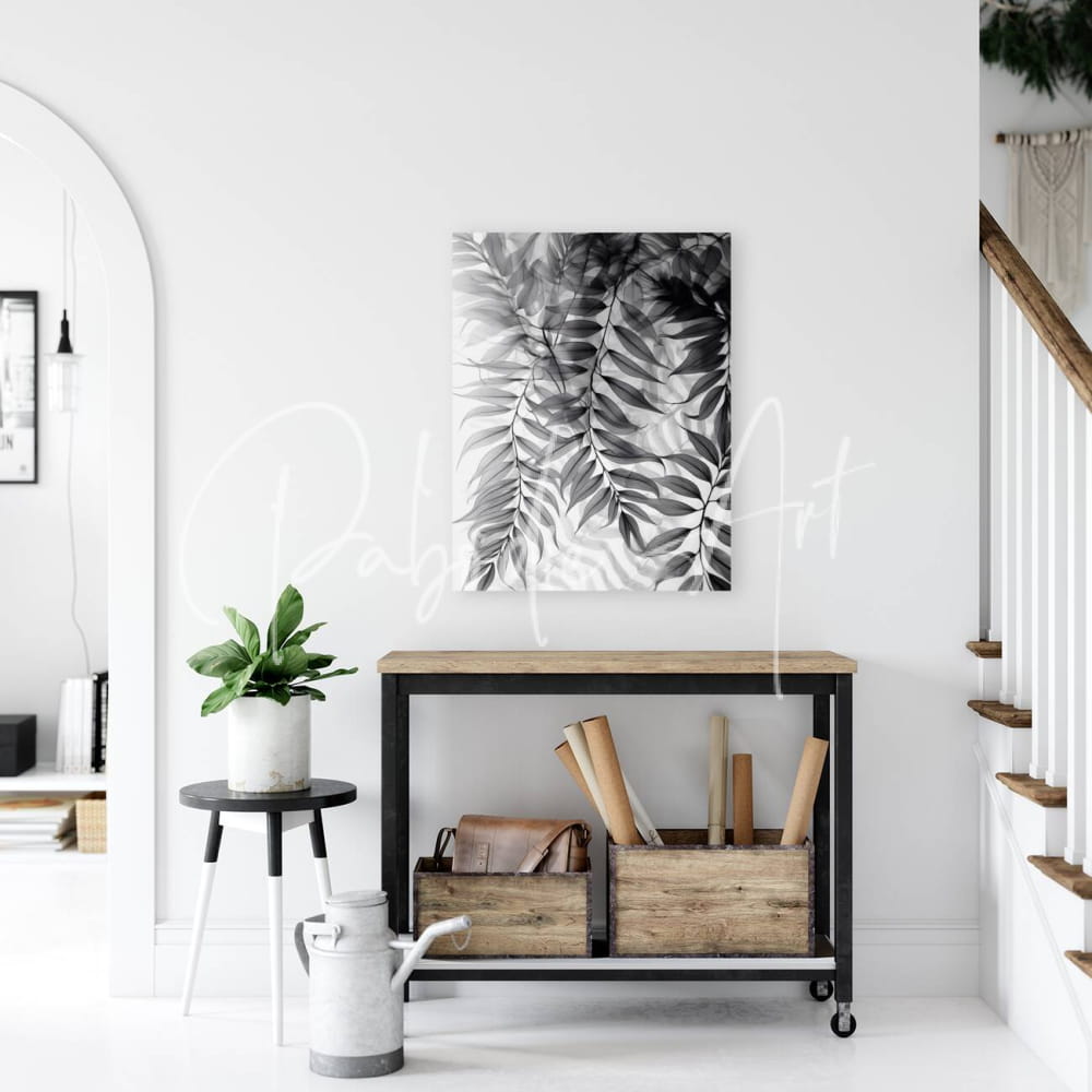 Black and white canvas print of tropical leaves titled tropical transparencies iii hanging on a wall