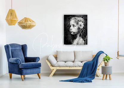 Black-and-white portrait canvas titled Windswept Curls featuring a young girl with flowing hair and flower in a minimalist living room