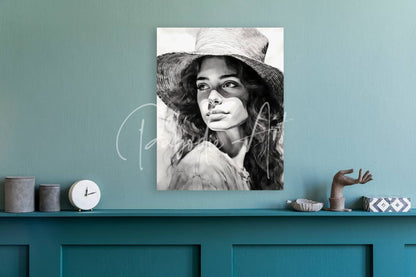 Black-and-white portrait canvas of a woman in a wide-brimmed hat titled a womans casual glance